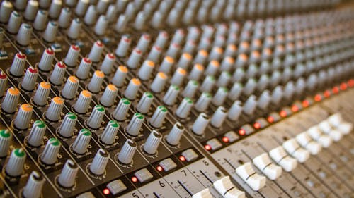 Control Knobs and Faders of a Soundboard