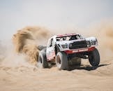 Offroad Car Going Through Sandy Desert