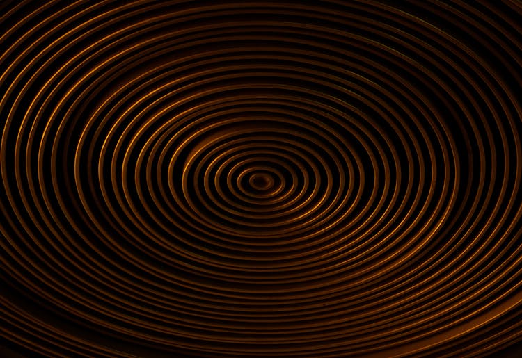 Brown Spiral Illustration On Black Background 