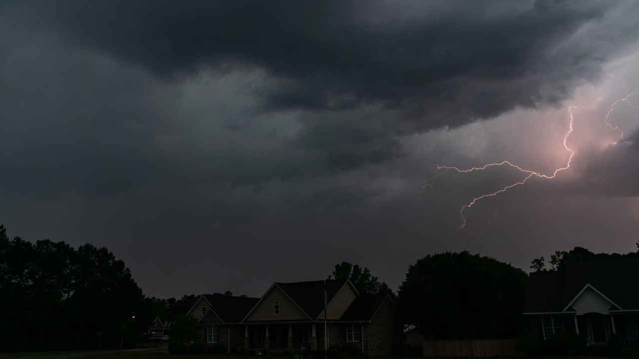 capture of a lightning storm over suburban homes in north carolina usa