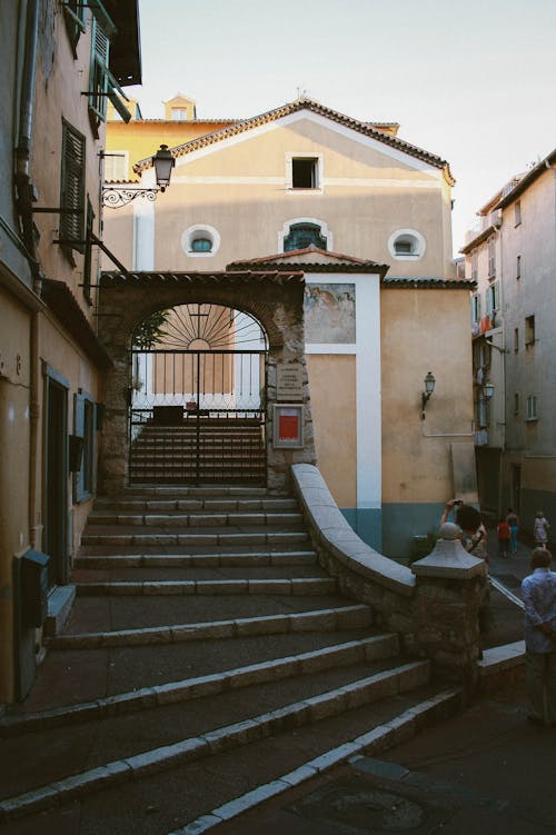 Closeup Photo of Staircase Near Building