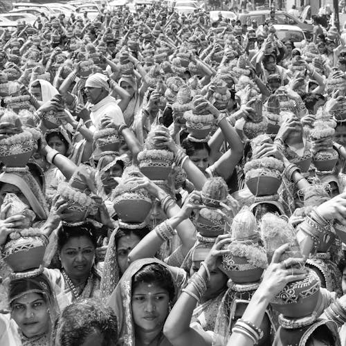 Grayscale Photo of People in Traditional Clothing