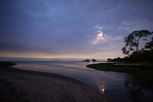 Kostenloses Stock Foto zu abend, fluss, küste