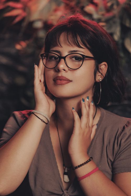 Free Portrait of a stylish woman with glasses in Fethiye, Turkey, showcasing modern fashion and accessories. Stock Photo