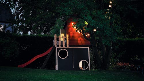 Free Blue and Red Wooden Play Yard at Night Time Stock Photo