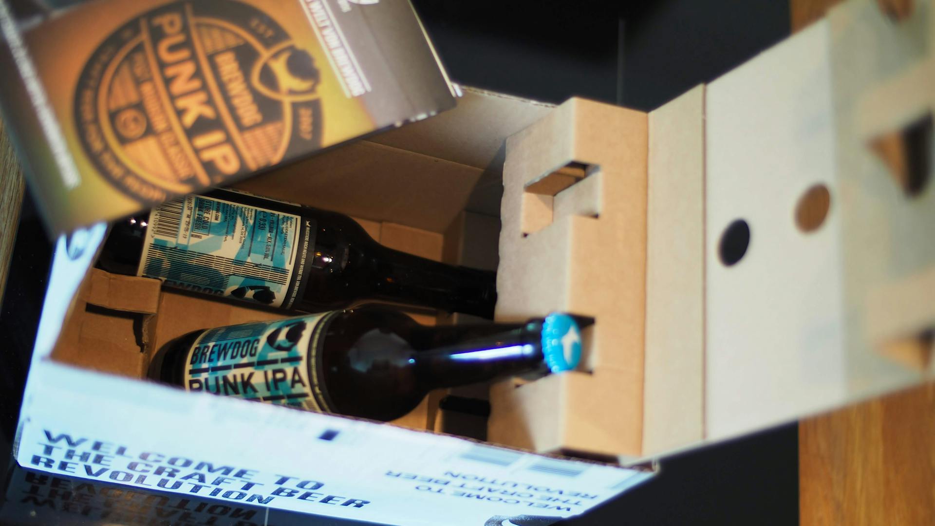 Close-up of BrewDog Punk IPA bottles in a cardboard box.