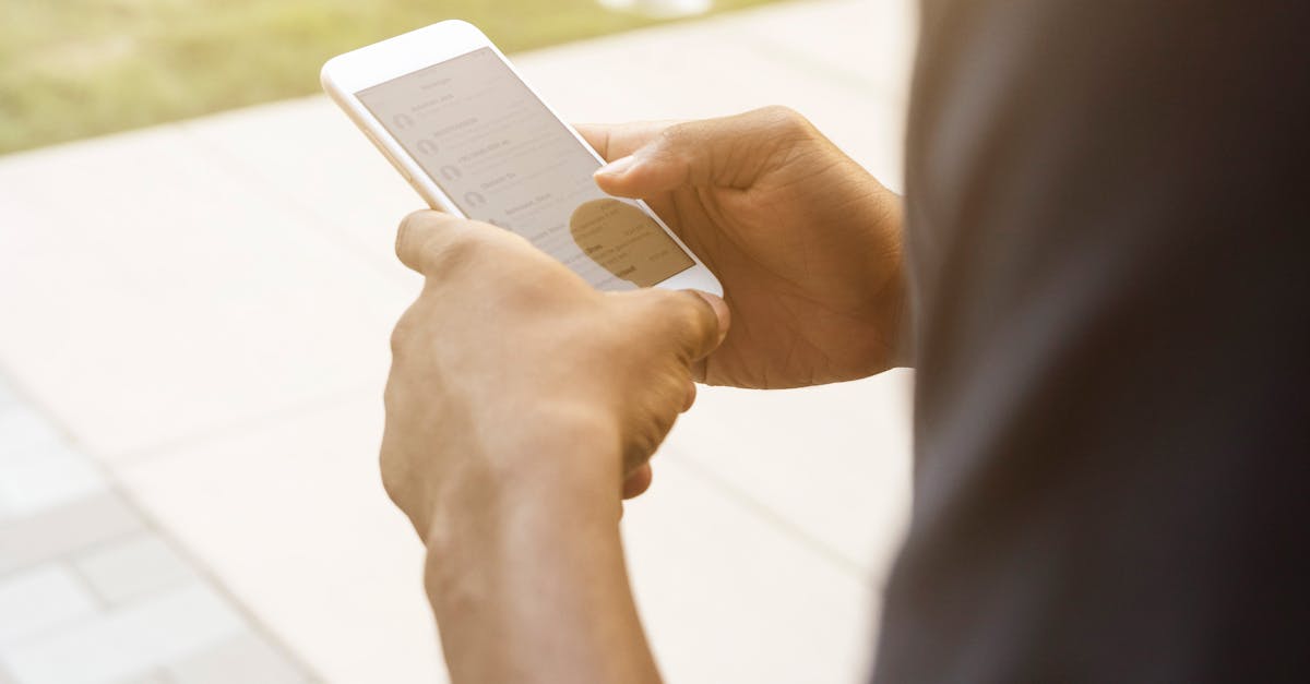 Close-Up photography of Person Using Mobile Phone · Free Stock Photo