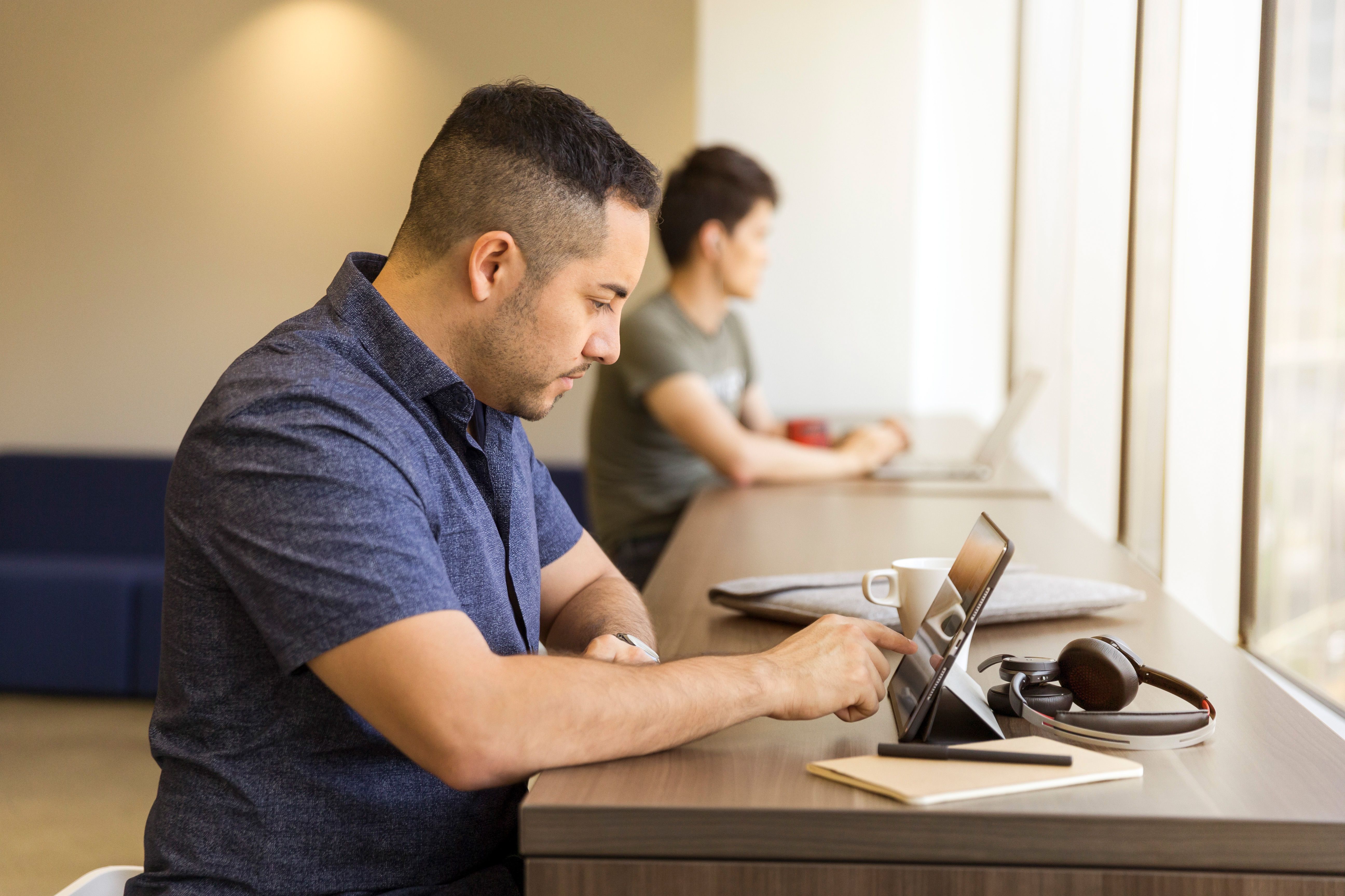 Woman working remotely on a laptop