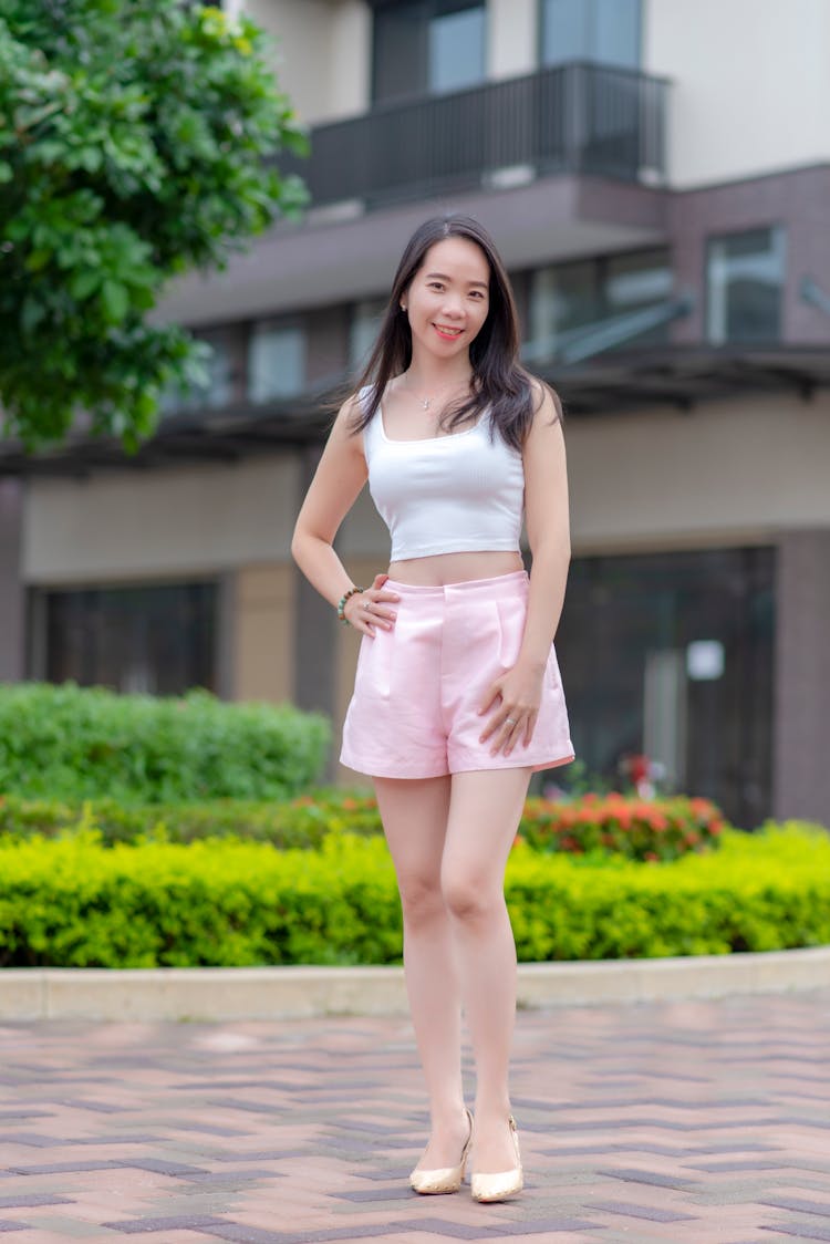 Smiling Brunette In Shorts