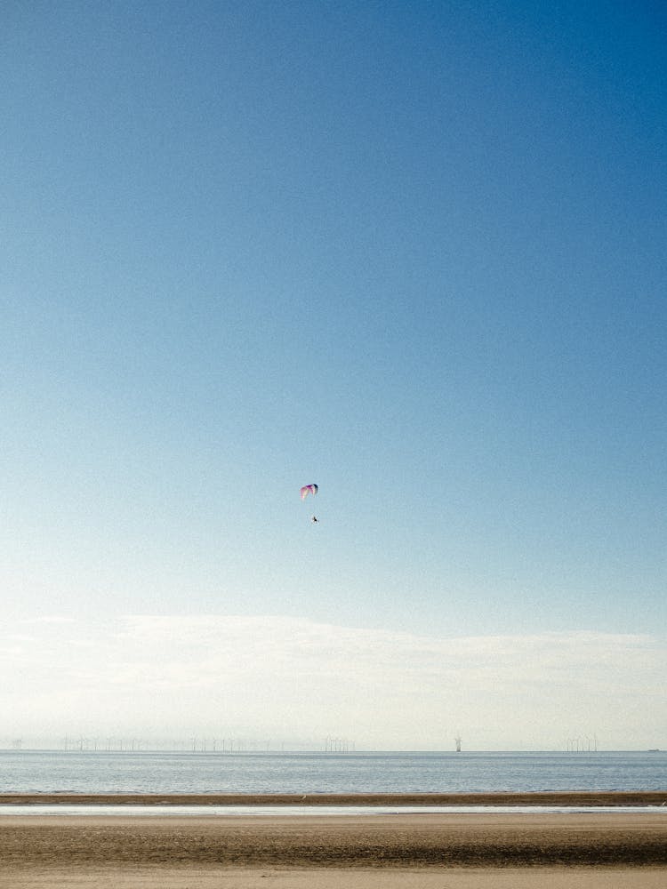 Paraglider Over Clear Sky