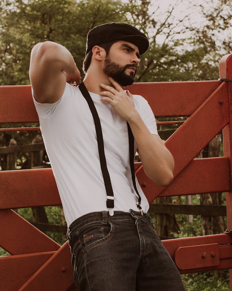 Man In T-shirt With Suspenders