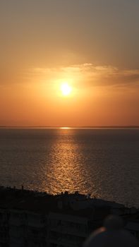 A stunning sunset over the Aegean Sea, capturing the serene beauty from İzmir, Türkiye.
