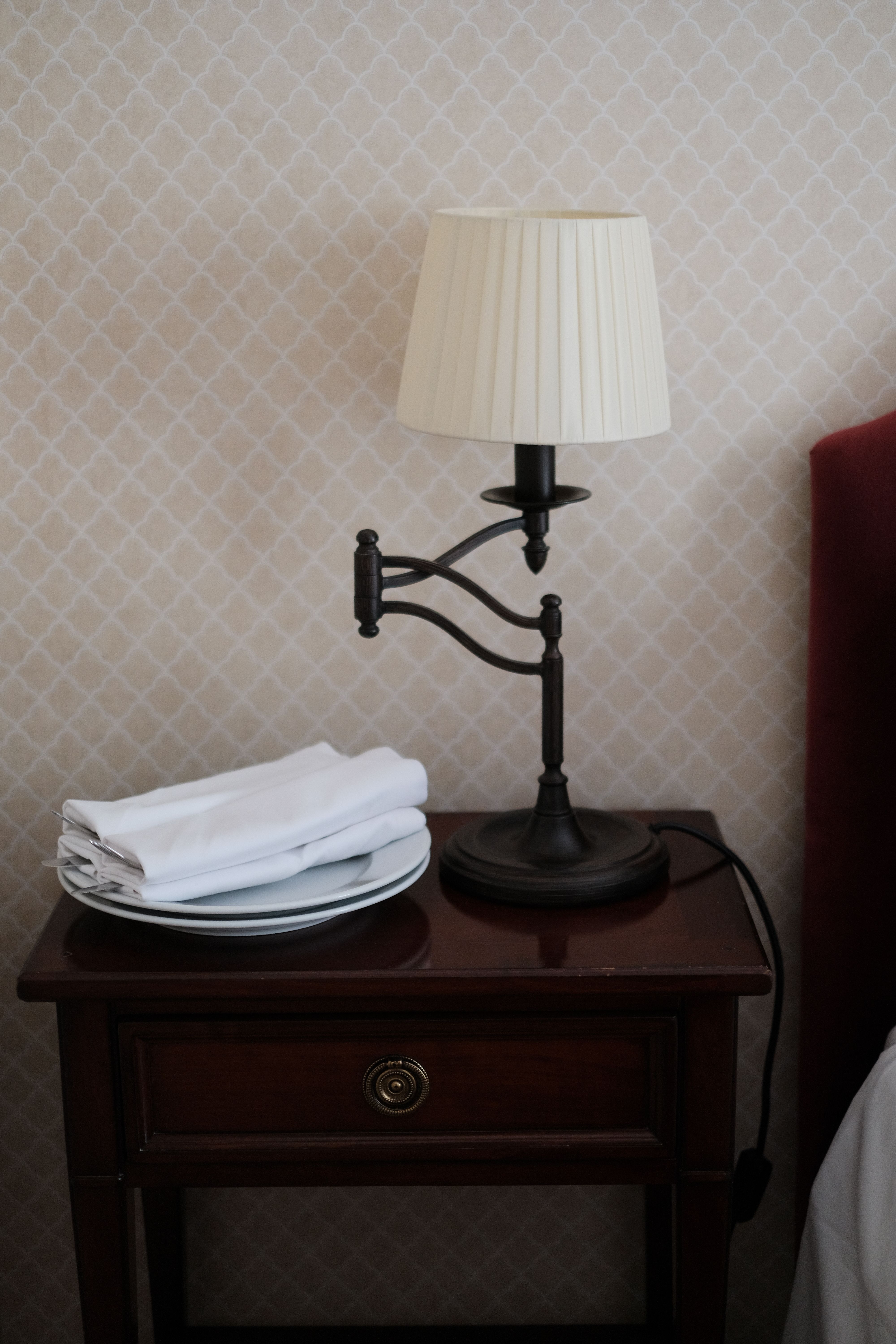White and Black Lamp on Wooden Table · Free Stock Photo