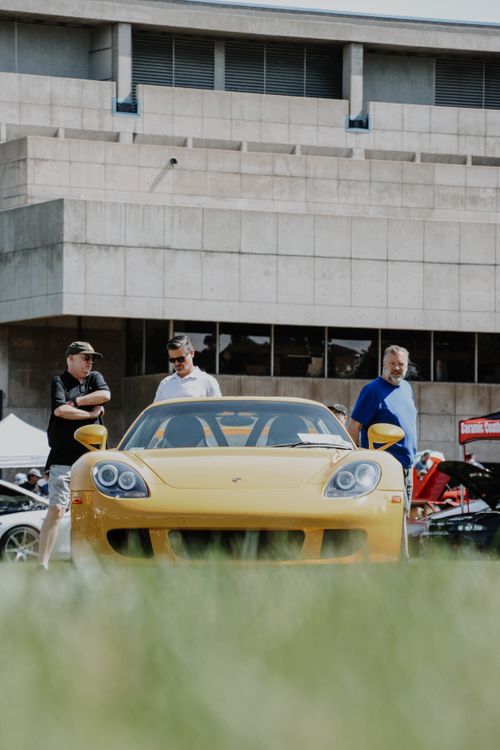 A Yellow Sportscar in a Car Show · Free Stock Photo