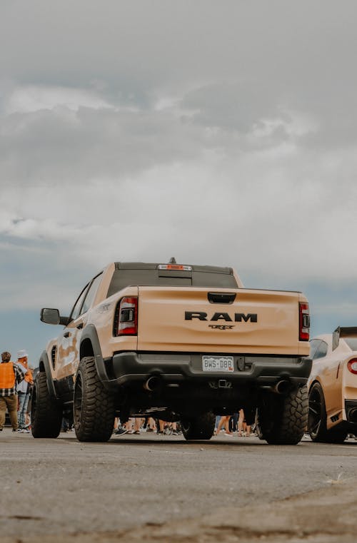 Beige Pickup Truck on Concrete Pavement