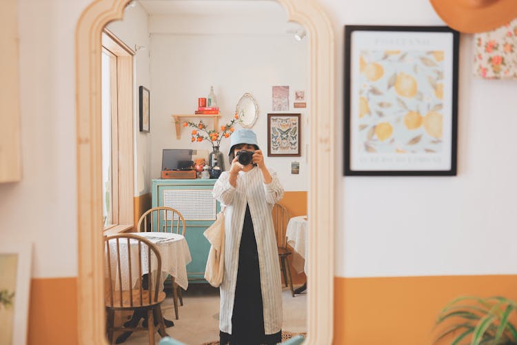 Woman Taking A Picture Using A DSLR Camera