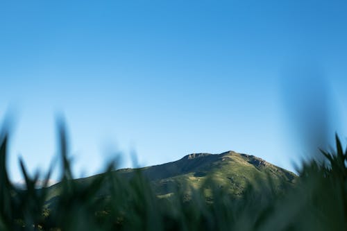 A Mountain under a Blue Sky