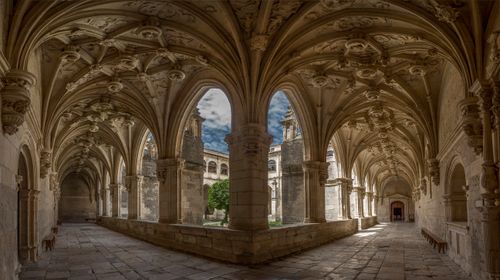 Free Intricate architectural design of the cloisters at Monasterio de San Zoilo, Palencia, Spain. Stock Photo