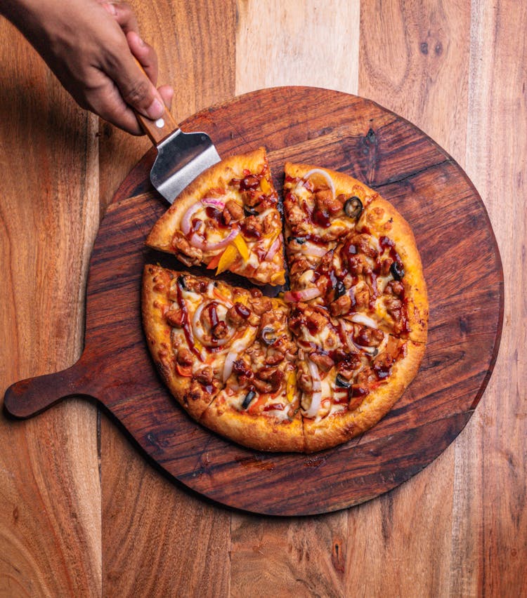 Homemade Pizza On Wooden Board