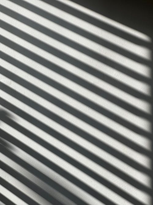 Darmowe zdjęcie z galerii z cień, pionowy strzał, podłoga
