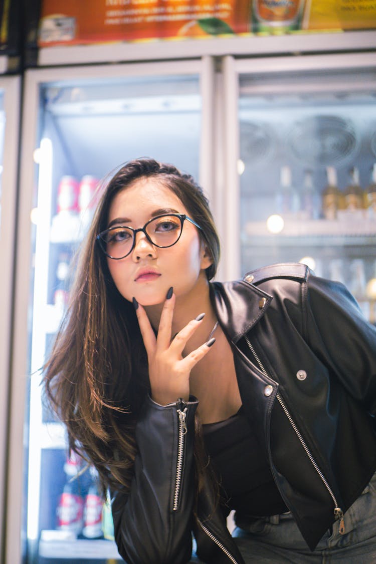 Young Woman In Black Jacket Inside A Store