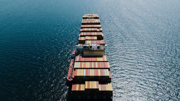 Fully Loaded Cargo Ship On A Sea 