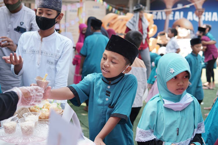 Kids Enjoying Food In The Party