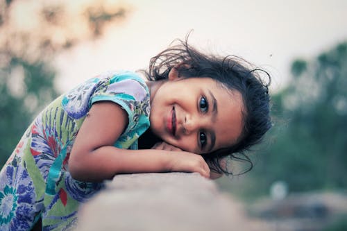 A Girl Lying on the Ledge