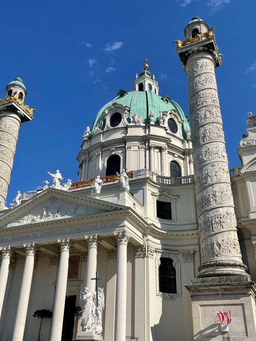 Free Stunning view of the Karlskirche Baroque facade in Vienna, highlighting intricate design and vibrant color. Stock Photo