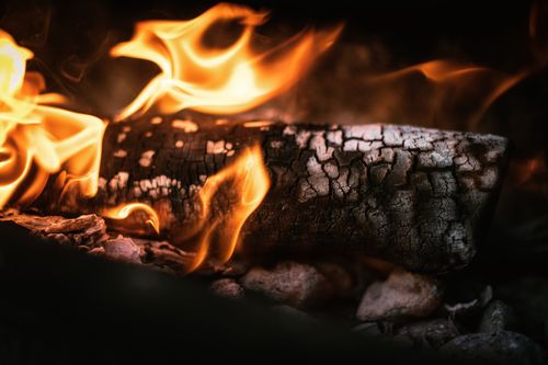 Free Close-up of crackling firewood in burning flames, showcasing heat and intensity. Stock Photo