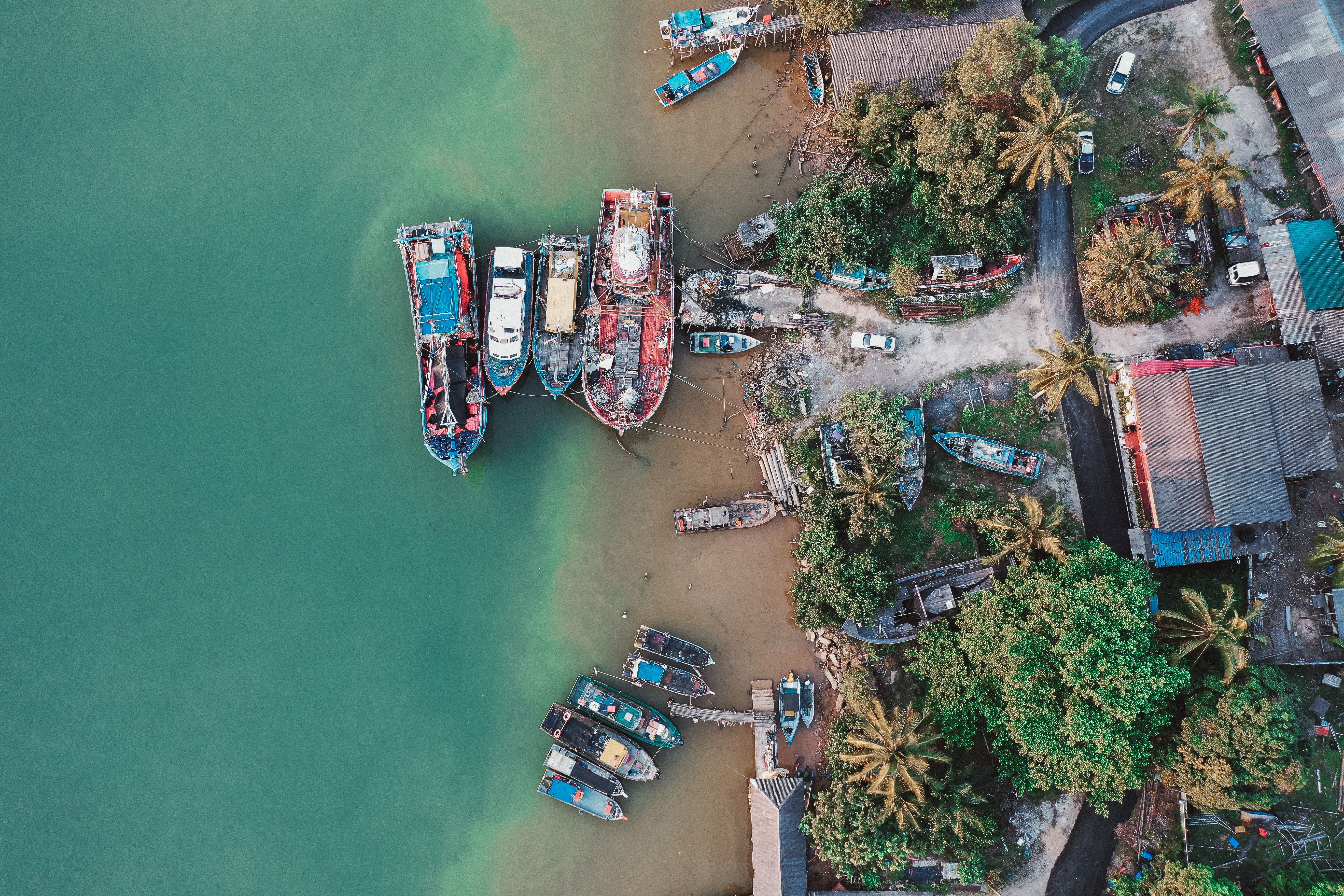 Birds Eye View of Wooden Boats on the Shore · Free Stock Photo