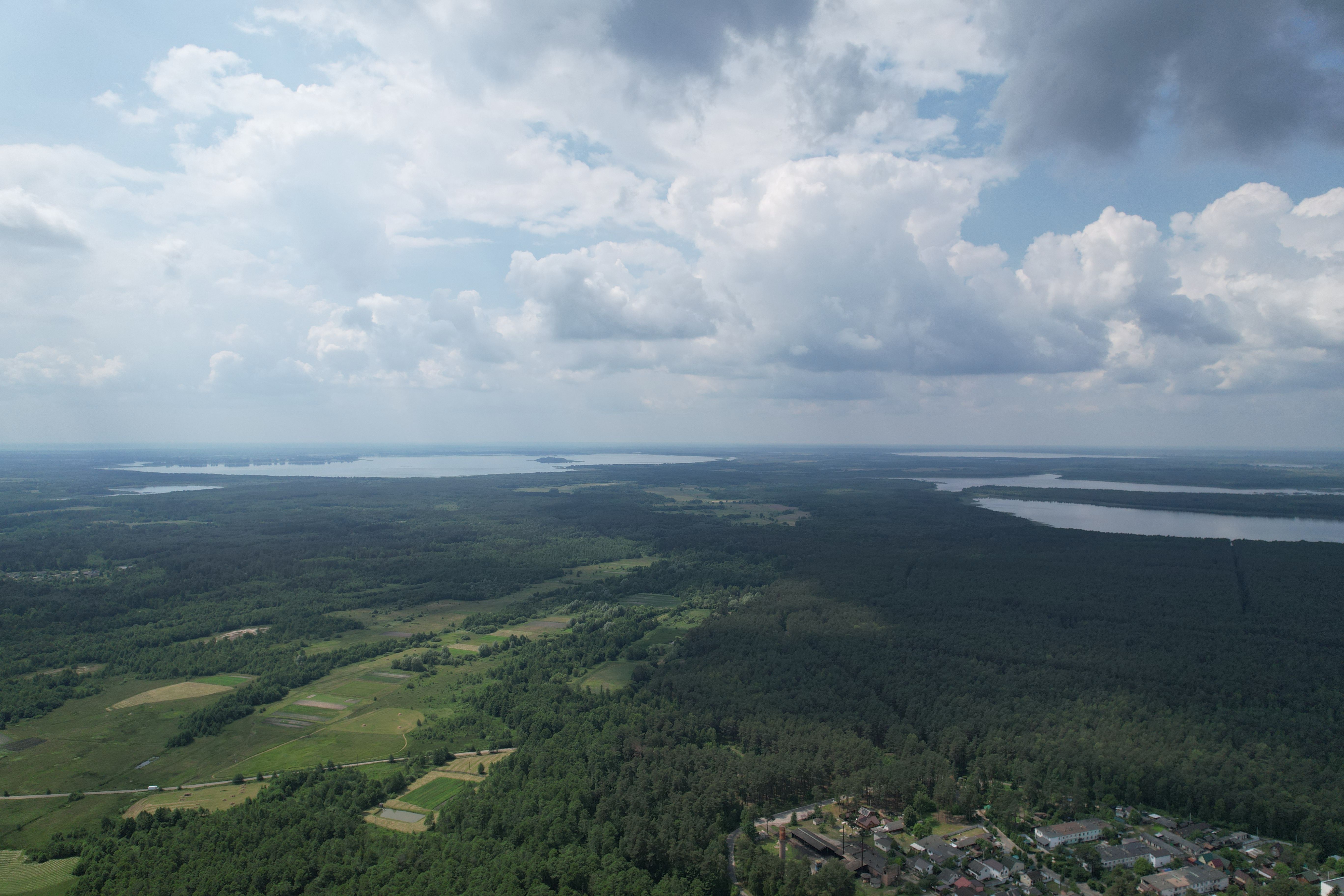 Stunning drone view of lush countryside and lakes in Haivka, Volyn Oblast, Ukraine.