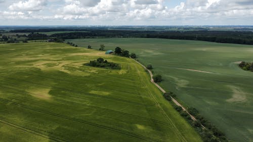 arazi, çim saha, drone çekimi içeren Ücretsiz stok fotoğraf