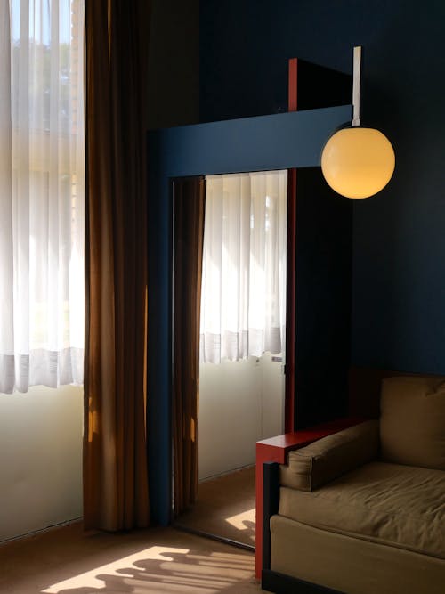 Room with Yellow Lamp and Curt