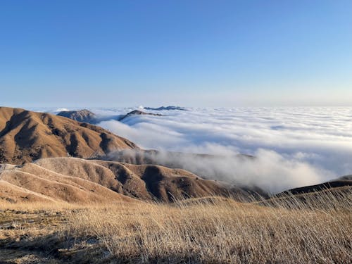 Δωρεάν στοκ φωτογραφιών με highlands, θάλασσα από σύννεφα, καθαρός ουρανός Φωτογραφία από στοκ φωτογραφιών