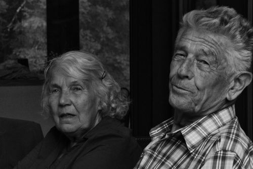 Free Black and white portrait of an elderly couple indoors, conveying warmth and wisdom. Stock Photo