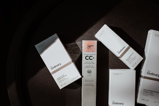 Elegant flat lay of skincare products in soft lighting.