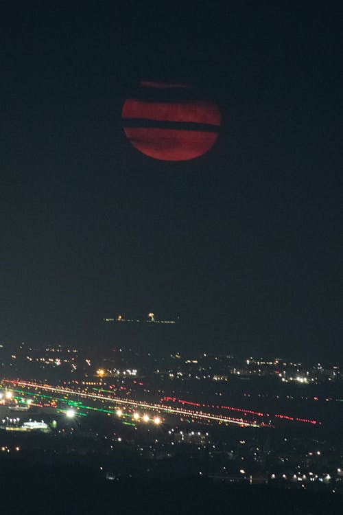 Immagine gratuita di alba lunare, caccia alla luna, city_skyline