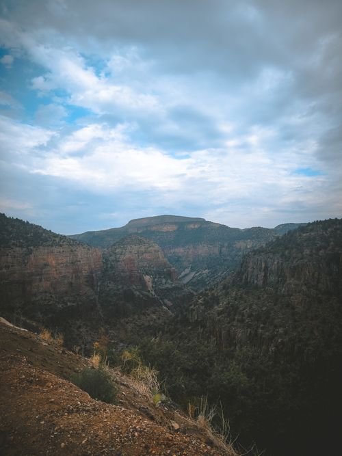 Free Vast scenic landscape of rocky mountains under a cloudy sky in New Mexico, USA. Stock Photo