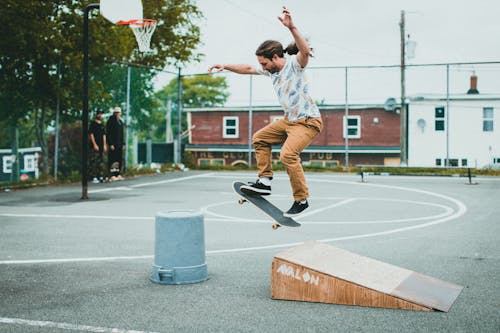 Man Jumping on Skateboard 