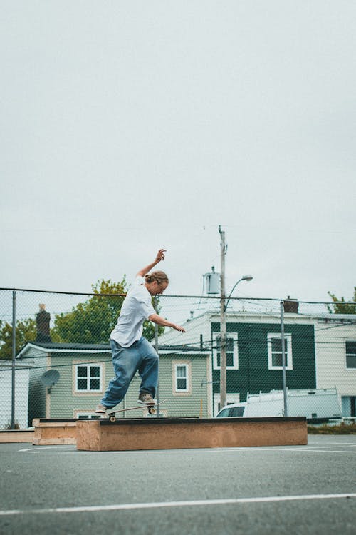 A Man using Skateboard