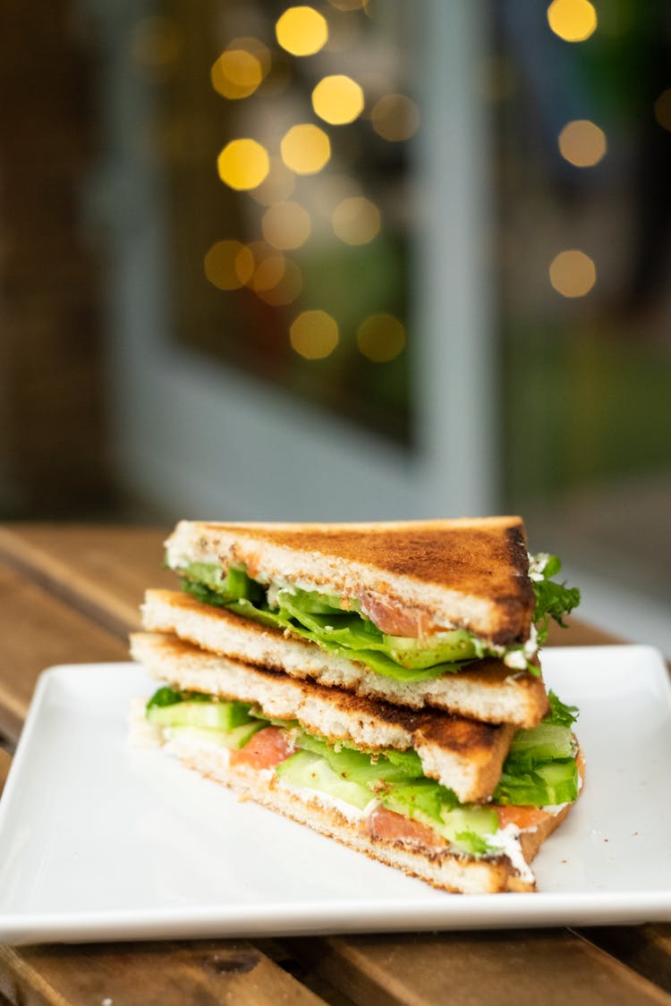 Cut Toast With Lettuce On A Plate