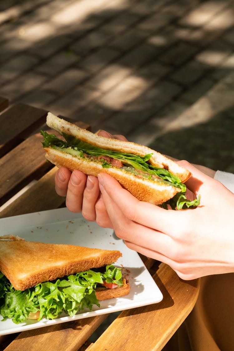 Cut Toast In Hands 