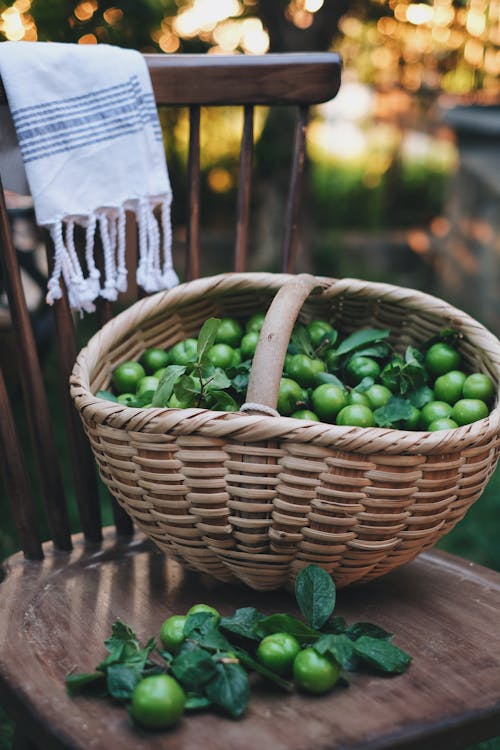 A Fresh Limes on a Woven Basket
