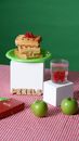 Clear Drinking Glass Beside Green Apple Fruit on Green Plastic Tray