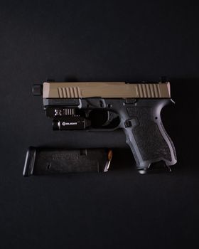 Black and Gray Semi Automatic Pistol in Close-up Shot
