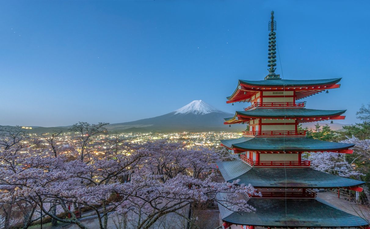 Red and Green Pagoda Temple Near Trees and Mountain · Free Stock Photo