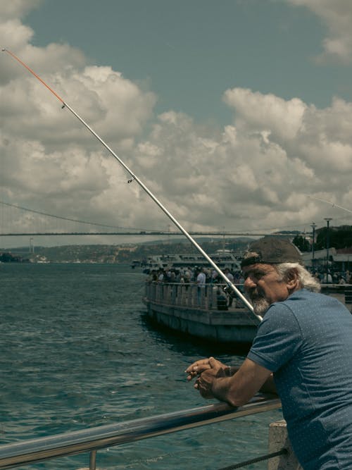 Kostenloses Stock Foto zu angeln, angelrute, geländer