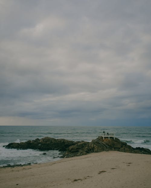 Free A Cloudy Day at a Beach Stock Photo