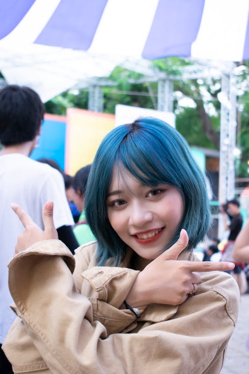 Blue-haired Woman Wearing Brown Long-sleeved Top